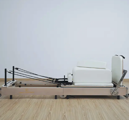 Wooden Fold Pilates Reformer .png